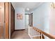 Upstairs hallway features carpet floors and light blue walls at 108 Birdie Ct, Rocky Mount, NC 27804