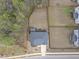 Aerial view of the lot with a fenced backyard and patio at 111 Kim Bark Path, Garner, NC 27529