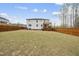 Spacious backyard with wood fencing and ample space for activities at 111 Kim Bark Path, Garner, NC 27529
