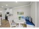 Comfortable breakfast nook with bench seating, a round table and great kitchen access at 111 Kim Bark Path, Garner, NC 27529