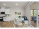 Cozy breakfast nook offers built in bench seating and kitchen access at 111 Kim Bark Path, Garner, NC 27529