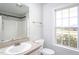 Bathroom featuring a single sink vanity, toilet, and shower at 114 Hudson Dr, Princeton, NC 27569