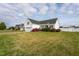 Inviting single-story home with a spacious front yard, a two-car garage, and a welcoming exterior at 114 Hudson Dr, Princeton, NC 27569