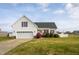Charming single-Gathering home with a two-car garage, well-maintained lawn, and inviting curb appeal at 114 Hudson Dr, Princeton, NC 27569