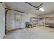 Spacious garage with ample room for parking and storage features a convenient side entrance at 11404 Leesville Rd, Raleigh, NC 27613