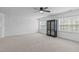 Bedroom featuring light colored carpet and plenty of natural light at 120 Wellspring Dr, Holly Springs, NC 27540