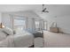 Spacious main bedroom featuring vaulted ceilings, plush carpeting, and natural light at 120 Wellspring Dr, Holly Springs, NC 27540