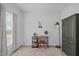 Well-lit home office with functional desk, storage, and stylish decor at 120 Wellspring Dr, Holly Springs, NC 27540