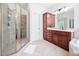 Bathroom showcasing a glass shower, vanity, and tile flooring at 1204 Croydon Glen Ct, Cary, NC 27519