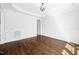 Bright dining room featuring hardwood floors, and white trim at 1204 Croydon Glen Ct, Cary, NC 27519