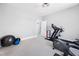 Home gym with exercise equipment and neutral walls offers a great space for working out at 1204 Croydon Glen Ct, Cary, NC 27519