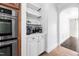 Kitchenette area featuring a coffee bar and built-in oven at 1204 Croydon Glen Ct, Cary, NC 27519