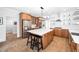 Spacious kitchen featuring stainless steel appliances and a large center island with seating at 1204 Croydon Glen Ct, Cary, NC 27519