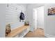 Charming mudroom with custom built-in bench, adding functional style at 1204 Croydon Glen Ct, Cary, NC 27519