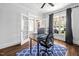 Bright office with french doors, hardwood flooring and a window overlooking the front yard at 1204 Croydon Glen Ct, Cary, NC 27519