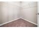 Spacious walk-in closet features neutral carpet and wire shelving at 1220 Falcon Ridge Ln, Morrisville, NC 27560