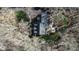 Birds-eye view of the home highlighting its backyard patio and lush surroundings at 1229 Westerham Dr, Wake Forest, NC 27587