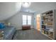 Bedroom with bookshelf, storage chest, and window at 1229 Westerham Dr, Wake Forest, NC 27587