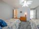 Light-filled bedroom features twin beds and an ensuite bathroom at 1229 Westerham Dr, Wake Forest, NC 27587