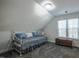 Bedroom features a daybed, dormer window, and vaulted ceiling for a cozy retreat at 1229 Westerham Dr, Wake Forest, NC 27587