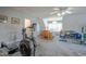 Home gym area with gym equipment, open space and neutral colored walls and carpet at 1229 Westerham Dr, Wake Forest, NC 27587