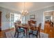 Dining room with hardwood floors, a chandelier, and a table with seating at 1229 Westerham Dr, Wake Forest, NC 27587