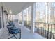 Inviting porch with comfortable seating and views of the surrounding landscape at 1229 Westerham Dr, Wake Forest, NC 27587