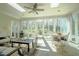 Sunroom with large windows, skylights, and a view of the backyard at 1229 Westerham Dr, Wake Forest, NC 27587