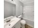 Clean bathroom with a tub/shower combo and modern fixtures at 129 Bridges Ln, Youngsville, NC 27596