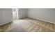 Large upstairs bedroom featuring neutral decor and new carpets at 129 Bridges Ln, Youngsville, NC 27596