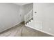 Entryway features a staircase, neutral carpet, and a bright, welcoming atmosphere at 129 Bridges Ln, Youngsville, NC 27596