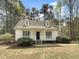 Charming single-story home featuring a welcoming front porch and dormer windows at 129 Bridges Ln, Youngsville, NC 27596