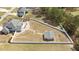 This property features a fenced backyard, an outbuilding and plenty of yard space at 14 E Saddle Ct, Archer Lodge, NC 27527