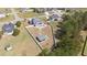 This property features a fenced backyard, fire pit, hot tub, outbuilding, and plenty of yard space at 14 E Saddle Ct, Archer Lodge, NC 27527
