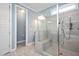 Modern bathroom features glass shower with bench, tile, and separate toilet area at 14 E Saddle Ct, Archer Lodge, NC 27527