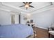 Bright main bedroom features hardwood floors, gray walls and high ceilings at 14 E Saddle Ct, Archer Lodge, NC 27527