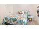 Comfortable bedroom with plush carpet, floral bedding and decoratives at 1409 Turner Farms Rd, Garner, NC 27529