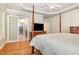 Spacious main bedroom with walk-in closet and ensuite bathroom at 1409 Turner Farms Rd, Garner, NC 27529