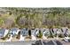 Beautiful homes are nestled among mature trees in this aerial view of the neighborhood at 142 Old Piedmont Cir, Chapel Hill, NC 27516