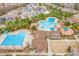 Aerial view of community pools and buildings, providing an overview of the neighborhood amenities at 142 Old Piedmont Cir, Chapel Hill, NC 27516