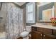 Full bathroom with shower/tub combo, granite counters and a framed mirror at 142 Old Piedmont Cir, Chapel Hill, NC 27516