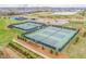 Aerial view of new tennis courts offering residents a place to exercise and socialize at 142 Old Piedmont Cir, Chapel Hill, NC 27516