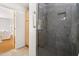 Modern bathroom with walk-in tiled shower, glass door, and sleek fixtures, offering a luxurious space at 1516 Cumberland Rd, Chapel Hill, NC 27514