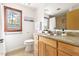 Bathroom showcasing vanity, granite countertops, and bright natural light at 1516 Cumberland Rd, Chapel Hill, NC 27514
