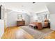 Cozy bedroom with hardwood floors, bright windows, and stylish decor at 1516 Cumberland Rd, Chapel Hill, NC 27514