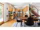 Dining room featuring a view of the kitchen, a modern dining set, and natural light at 1516 Cumberland Rd, Chapel Hill, NC 27514