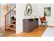 Inviting hallway with modern sideboard, decorative mirror, and a stylish butterfly chair at 1516 Cumberland Rd, Chapel Hill, NC 27514