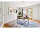 Bright home office with modern desk, stylish rug, and access to outdoor patio at 1516 Cumberland Rd, Chapel Hill, NC 27514