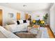 Inviting living room featuring neutral furniture, wood accents, and an abundance of natural light at 1516 Cumberland Rd, Chapel Hill, NC 27514