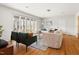 Open living room filled with natural light, showcasing serene views and hardwood floors at 1516 Cumberland Rd, Chapel Hill, NC 27514